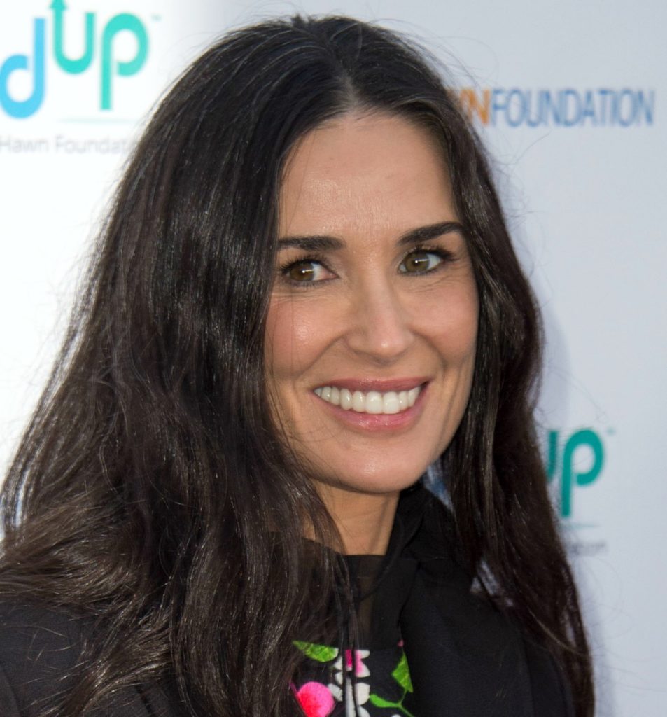 This particular demi moore hair style features hair tapered at the sides an...